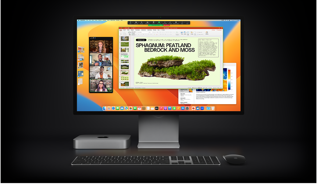 Mac mini, Magic Mouse, Magic Keyboard ja Studio Display. Näytöllä on Microsoft PowerPoint ‑esitys, jota jaetaan Zoom-kokouksessa. Taustalla näkyy Muistiinpanot-appi.