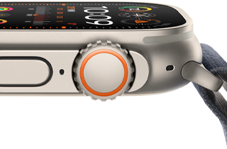 Apple Watch Ultra 2, jossa näkyy järeä titaanikuori, tasainen näyttö, Digital Crown ja sivupainike